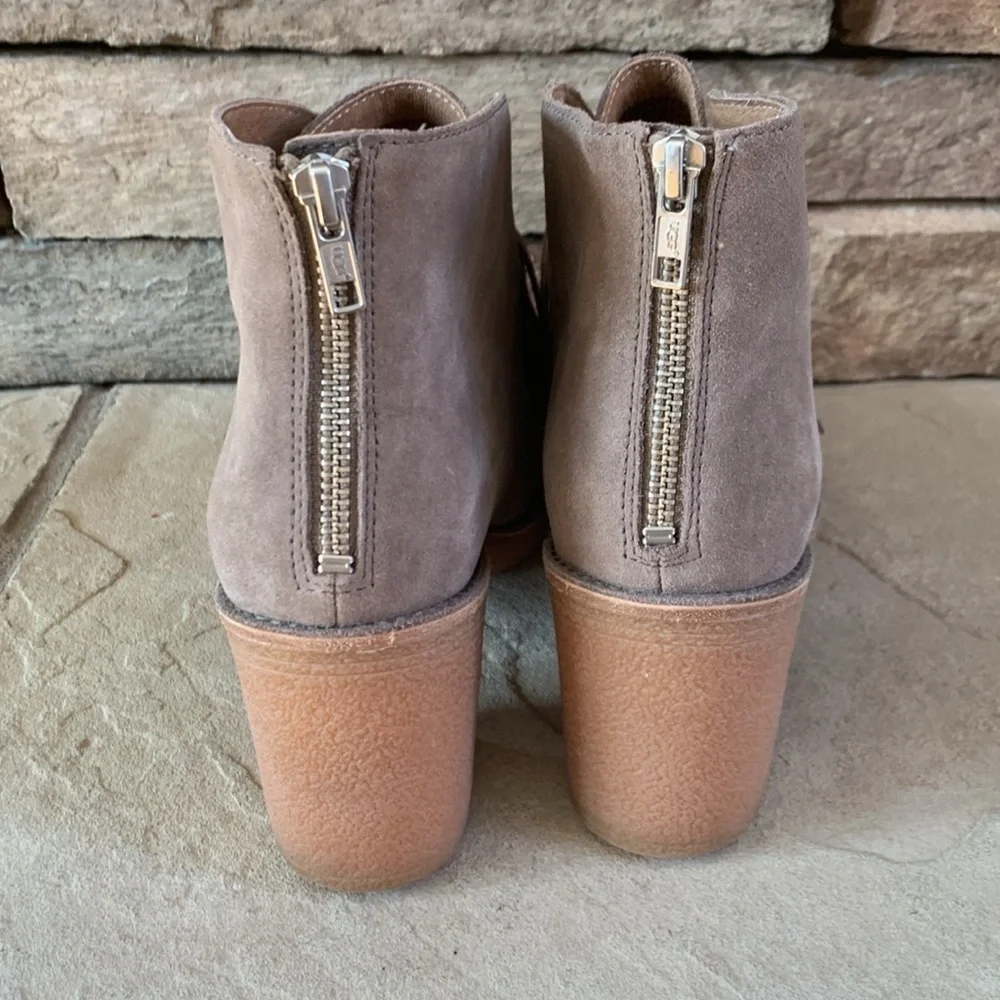 UGG sz 9 taupe heeled booties with front fringe and rubber heel